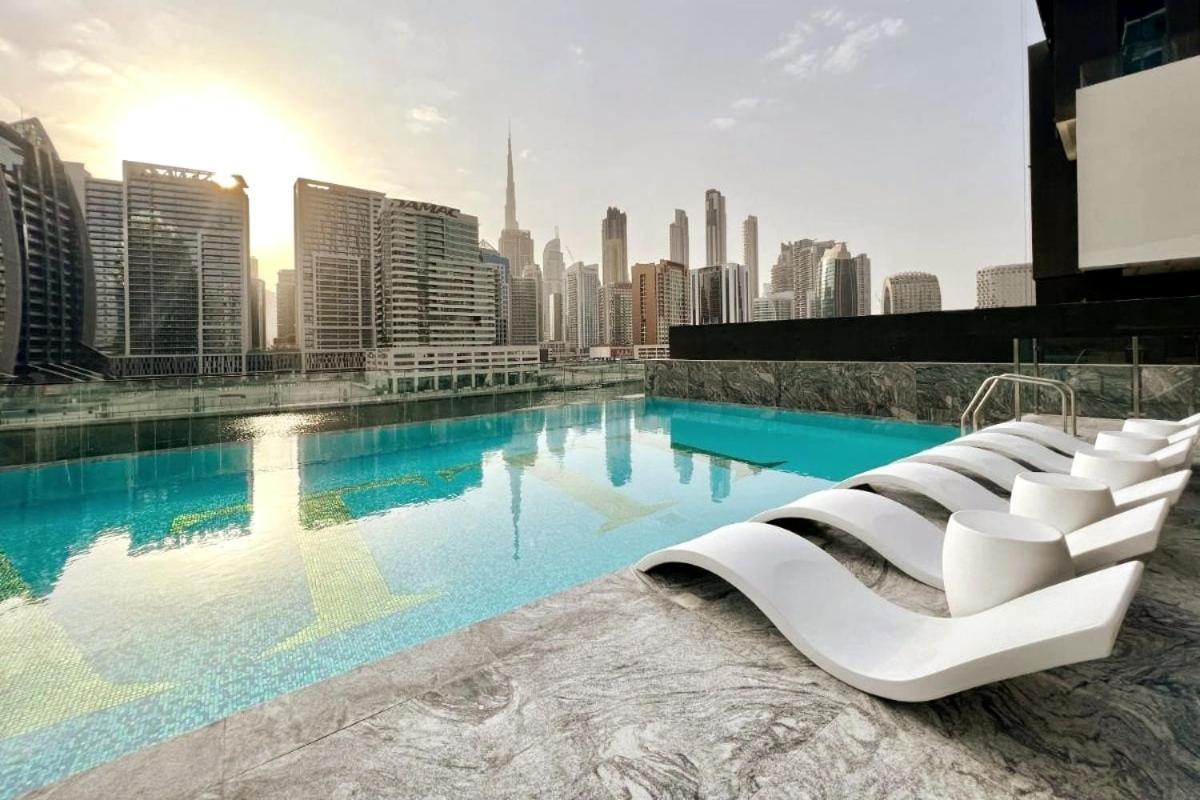 With Jaw-dropping Canal And Burj Views *
