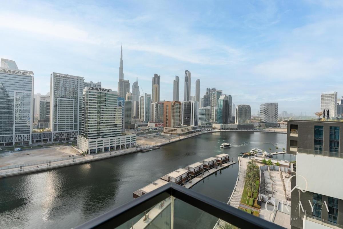 With Jaw-dropping Canal And Burj Views