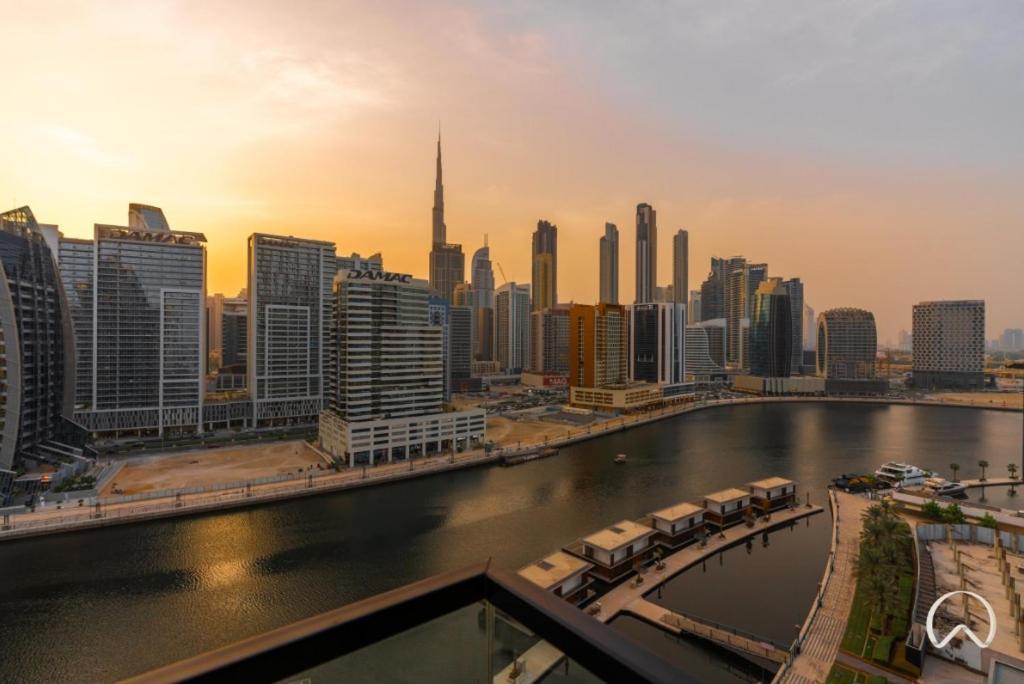 With Jaw-dropping Canal And Burj Views *